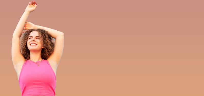 beautiful woman on blue background, wall in city. Happy, smiling isolated. Copy space, for text, outdoors. relaxation