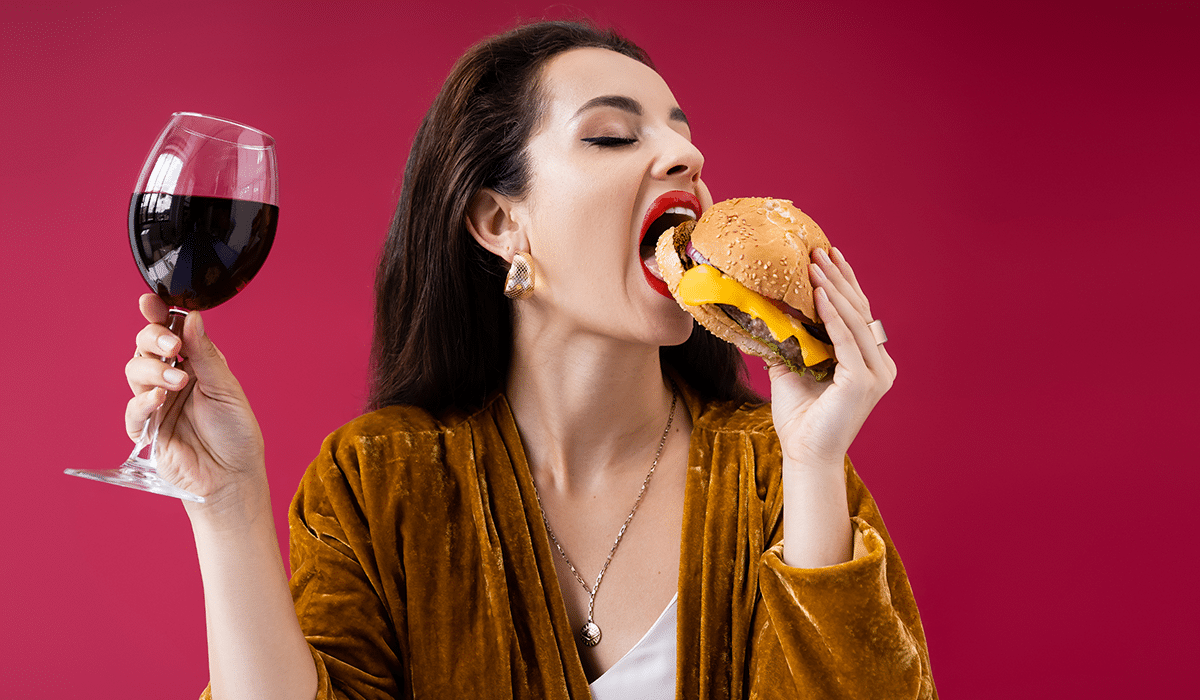 drinking wine and eating junk food