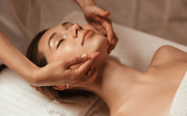 woman receiving crystal balance facial at Vida Aesthetics